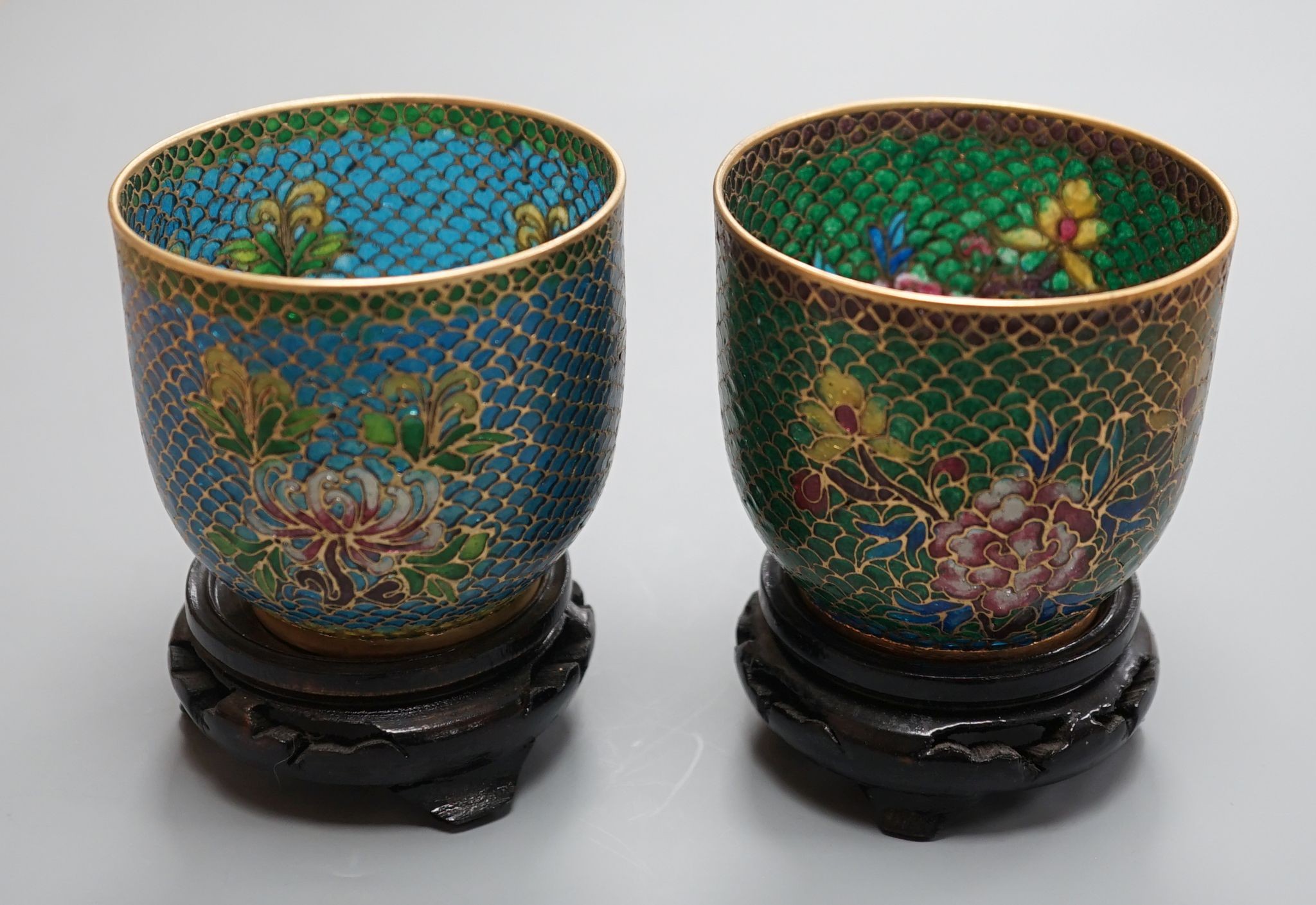 A pair of Chinese plique-a-jour cups (cased)
